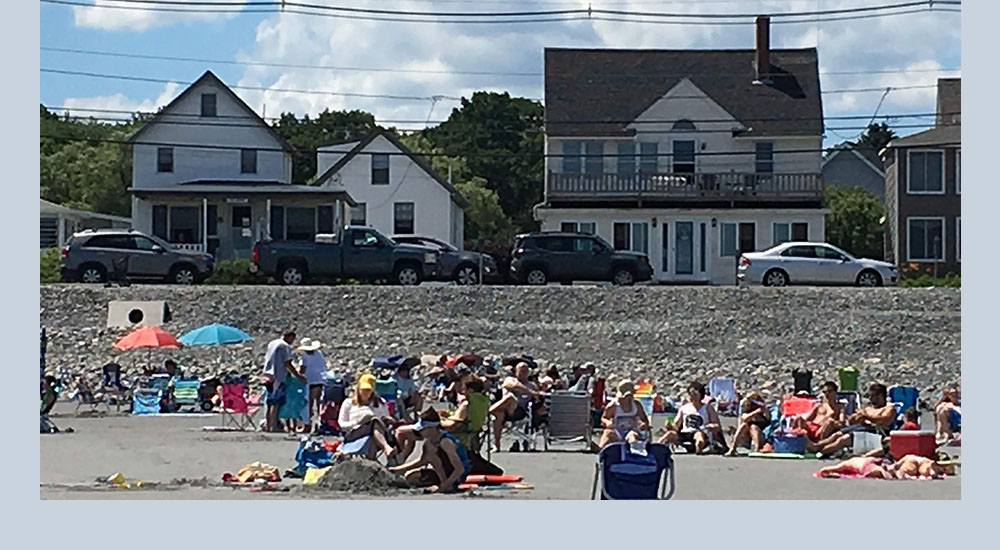 Sea Spray Cottages viewed from the beach